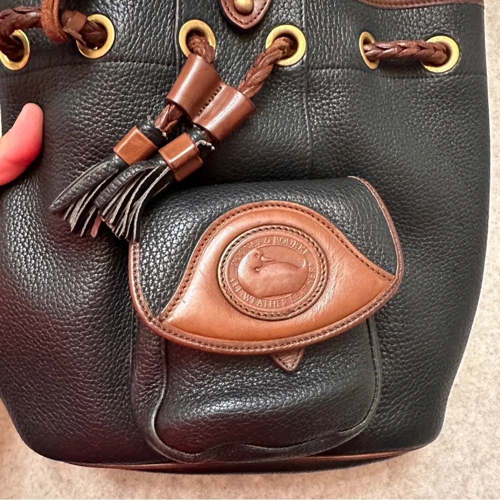 Vintage Dooney & Bourke Black w/Brown All Weather Leather Sling Small Backpack